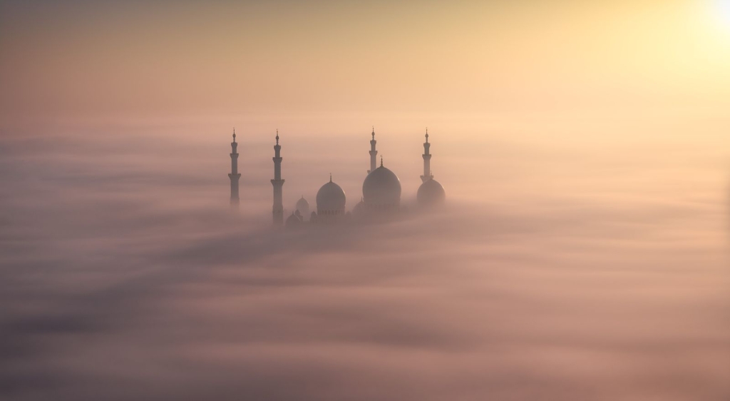 Photo and caption by Khalid Al Hammadi I was waiting for this scene a long time ago, The master piece Sheikh Zayed Grand Mosque floating and embracing by nature creates a magical rare scene during sunrise with its shadows reflected over the fog. I took this shot from the rooftop of 31 floor building in the first day of January, 2015, the first light of the new year was magical. I was chasing the weather everyday, after dozens of times I found what I was looking for, the moment that I can see how nature can embraces the architecture. Photo in Abu Dhabi